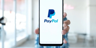 Why did PayPal acquire Paidy?